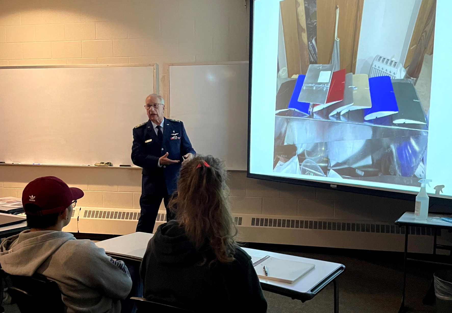 Spangler leads a slide presentation on  wing aerodynamics