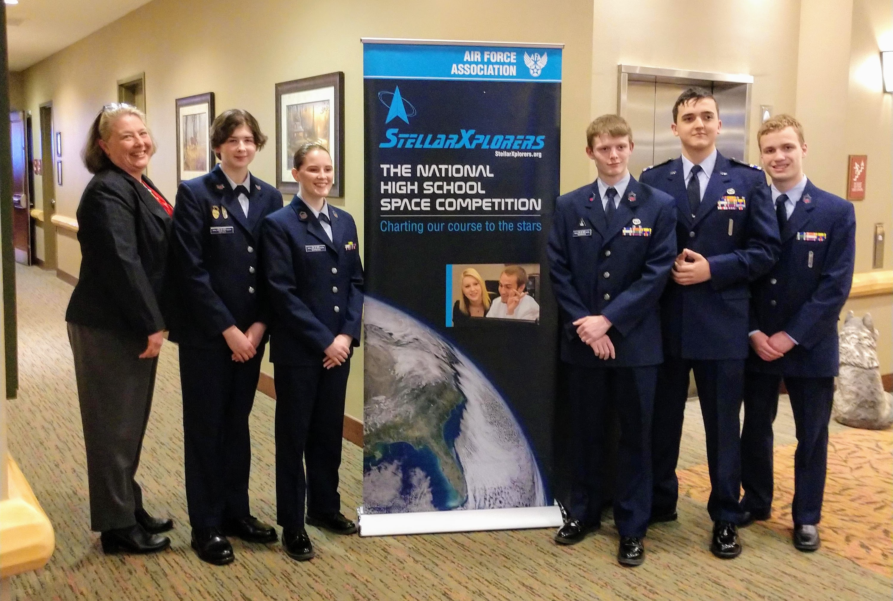 Lt. Col. Mary Albright poses with StellarXplorer cadet team 